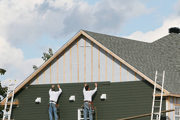 Professional Siding technician working in Grandy, NC